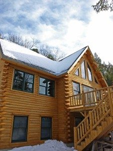 Designing for snow includes determining roof pitch and snow loads for Katahdin Cedar Log Homes