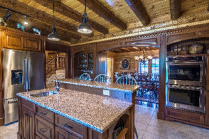 Kitchen island with online prep sink and seating