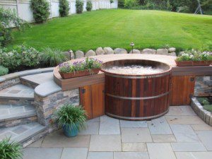 Maine cedar wood hot tub on backyard patio