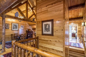 Victorian log home decor with modern elevator in Katahdin Cedar Log Home