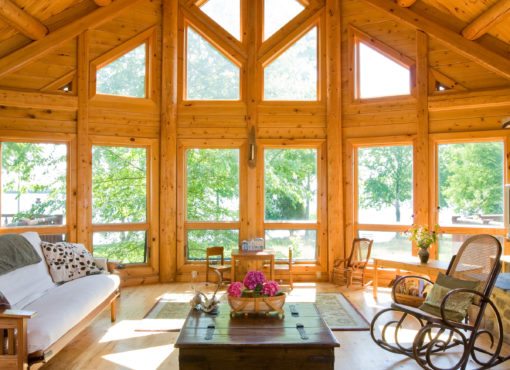 Custom Log Home interior with floor to ceiling windows
