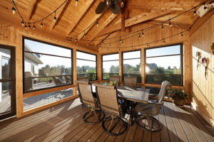 Adjust Scenix retractable screen windows to access breezes in your Katahdin Cedar Log Home