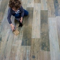 child on wood floor